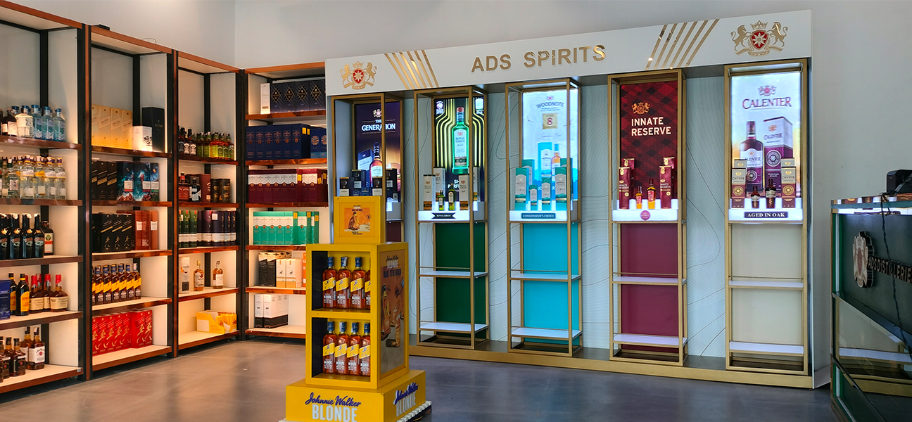 Woodnote Brand Shop Bahadurgarh retail liquor store interior by Next BC